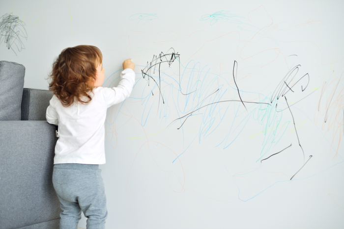 stain resistant paint, young child drawing on the wall