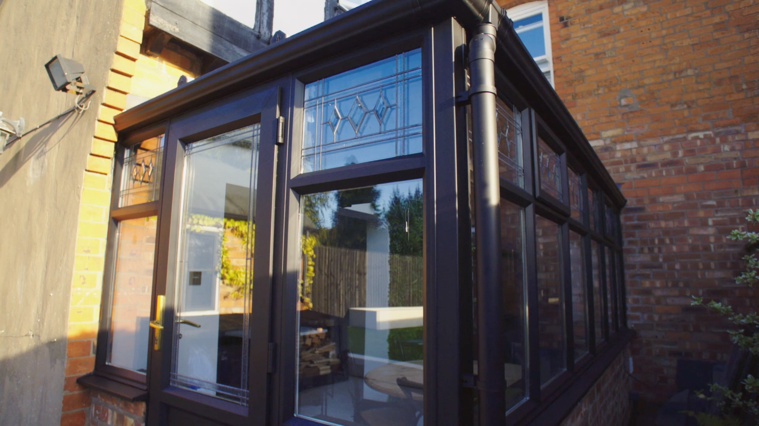 conservatory painted in black zinsser allcoat exterior matt paint